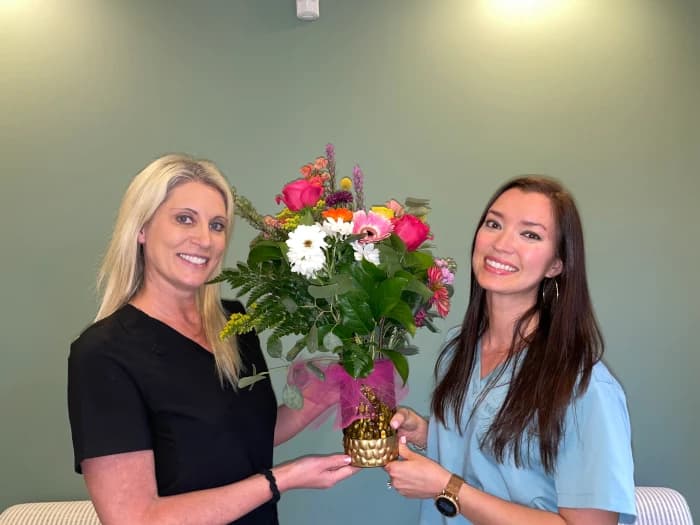 Crystal Cove Family Dental Hygienists Amanda and Christi smiling